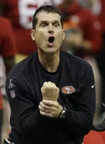 jim-harbaugh-gene-puskar-ap-620x844.webp