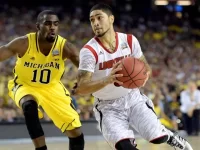 usp-ncaa-basketball_-ncaa-tournament-michigan-vs-l-siva-performance-4_3.webp