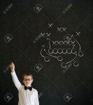 19727496-Hand-up-answer-boy-dressed-up-as-business-man-with-chalk-American-football-strategy-on-.jpg