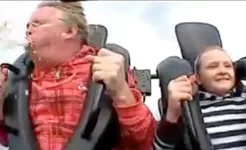 funny-dad-pukes-on-daughter-rollercoaster.webp