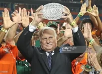 former-miami-coach-howard-schnellenberger-raises-the-1983-ncaa-a-picture-id178734495.webp