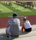 2 people stands.webp