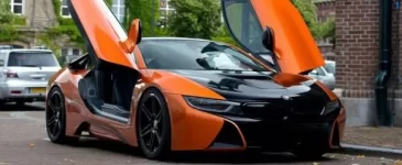 manharts-bmw-i8-wrapped-in-orange-and-black-spotted-in-the-netherlands-photo-gallery-98028-7.webp