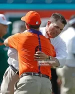 head-coach-al-golden-of-the-miami-hurricanes-and-head-coach-dabo-of-picture-id494168920.webp