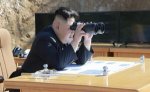 Kim-Jong-Un-using-binoculars-4-July-2017.jpg